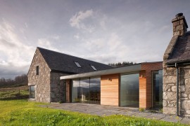 Wood brings inviting warmth to the stone cottage