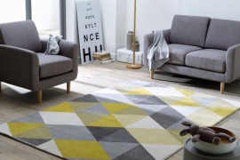 Yellow and gray rug adds a subtle pop of color