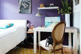 Yellow rug in purple bedroom