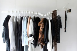 White faux branch used to hang clothing