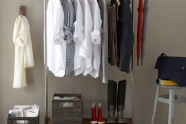 Old fashioned clothing rack used to display apparel and accessores