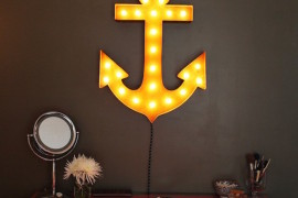 Anchor marquee sign hung above dresser