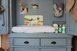 Armoire repurposed as a baby changing table