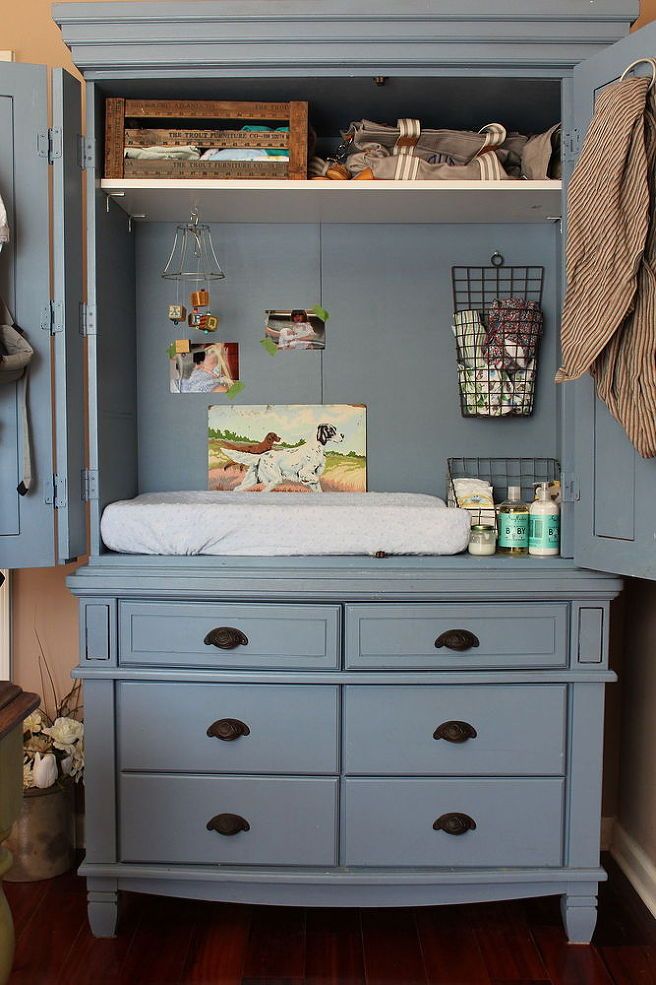 Armoire repurposed as a baby changing table