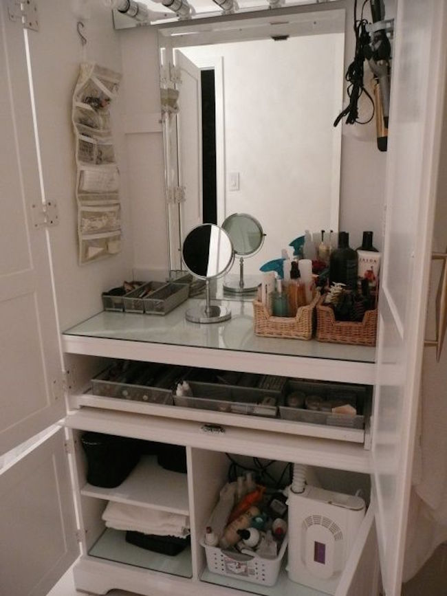 Armoire repurposed as a makeup station