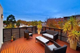 Balconies and roof deck blend into the floor plan of the interior in this warehouse renovation