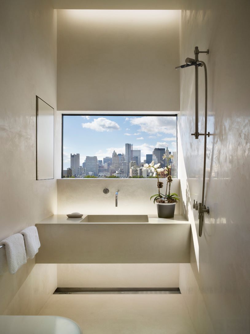 Bathroom window with a city view