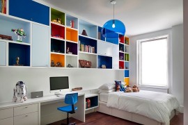 Boys' bedroom with multi-colored shelves and FLY Suspension Light in Blue