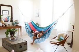 Colorful hammock added to a room in place of a couch