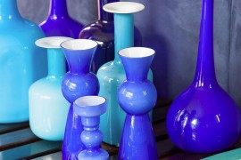 Curated collection of glossy vases in various shades of blue