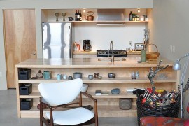 Family area and kitchen rolled into one in the rustic modern cabin [Design: Kate Gangi]