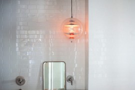 Farmhouse bathroom with a round tub