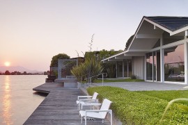 Floating deck above the lagoon offers perfect spot to enjoy sunset