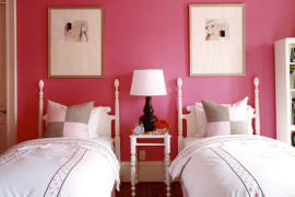 French cane beds against a boldly painted wall