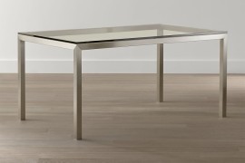 Glass and stainless steel dining table from Crate & Barrel