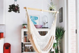 Hammock hung betwee the kitchen and a bright window