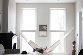 Hammock hung by two large windows