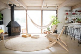 Hammock near the window of a house boat