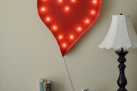 Heart marquee sign hung above desk