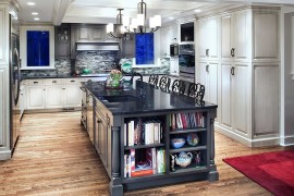 Kitchen island in gray with granite worktop [Design: jordan peterson interior design]