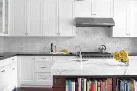 Marble top kitchen island offers ample space for your kitchen cookbooks [Design: Palmerston Design Consultants]