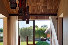 Metallic pendant lights add to the ambiance and style of the interior