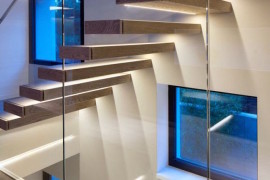 Oak and glass staircase with LED lighting strips