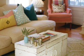 Old worn white trunk coffee table in living room