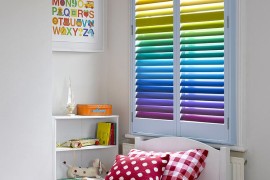 Rainbow colored plantation shutters steal the show here