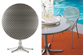 Round stainless steel dining table from Design Within Reach