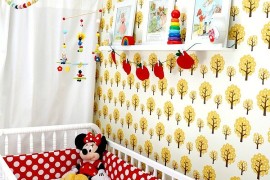 Scandinavian retro nursery with pops of yellow and red