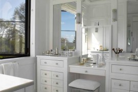 Separate makeup vanity area with upholstered stool