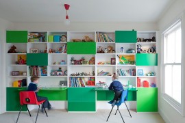 Shelves and workstation in kids' room with multiplle shades of green