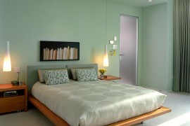 Sherwin Williams Slow Green shapes the lovely modern minimal bedroom