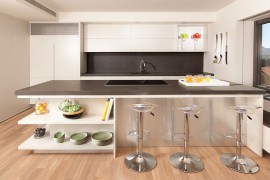 Sleek kitchen island is perfect for classy contemporary kitchen [Photography: Elad Gonen]