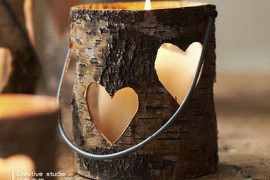 The light can shine through the cutout hearts in the wood