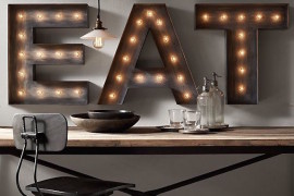 Three marquee letters to spell the word eat