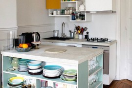 Tiny contemporary kitchen with island that features open shelving for smart storage