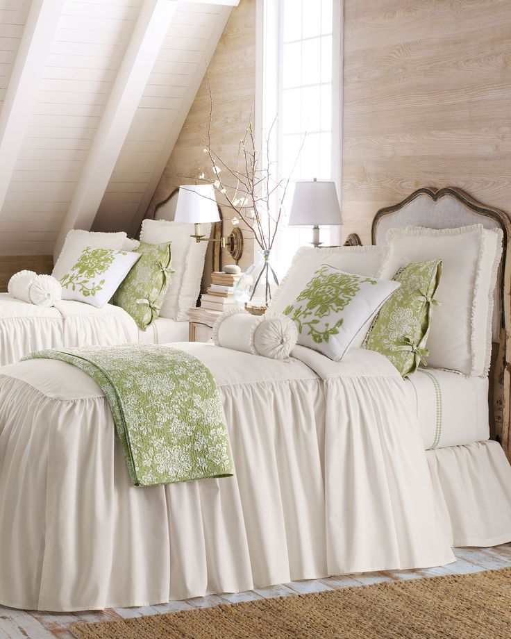 Two twin beds featuring Legacy Home Hampton bed linens