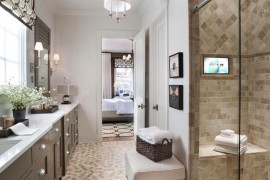 Upholstered ottoman in master bathroom