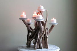 Votive candles on a driftwood candleabra