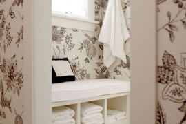 White bench with storage for towels