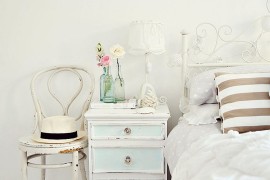 A beachy-vintage nightstand for the shabby chic interior [From: A Beach Cottage]