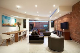 Add textural beauty to your living room with a cool brick wall [Design: S2 design]