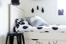 Adorable black and white rain cloud decor for a kids' bedroom