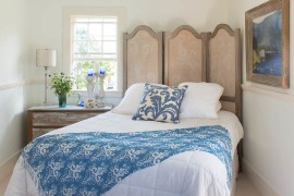 Antique french frame with handpainted screen and vintage bedside table in the bedroom