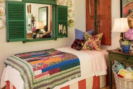 Beautiful shutters, flea market finds and pops of color for the shabby chic bedroom