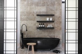 Black bathtub becomes the focal point of the contemporary bathroom