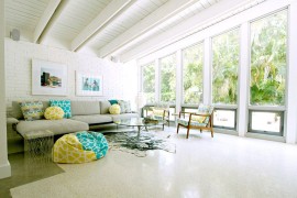 Breezy beach style living room with a hint of color [Photography: Mina Brinkey]