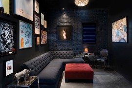 Brick wall living room idea for those who love a dark, black setting [Design: Cablik Enterprises]